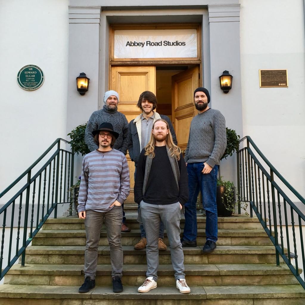 Foto of the recording team on the famous Abbey Road stairs a session with Dooley Records